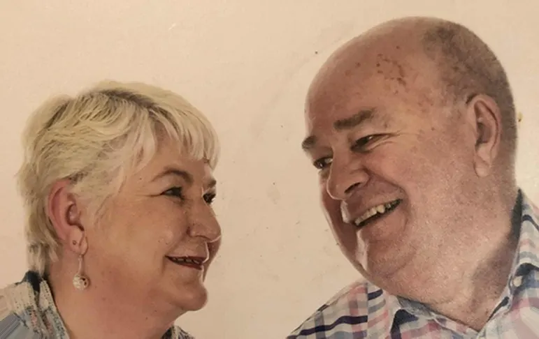 Reference photo of the couple used for the custom caricature